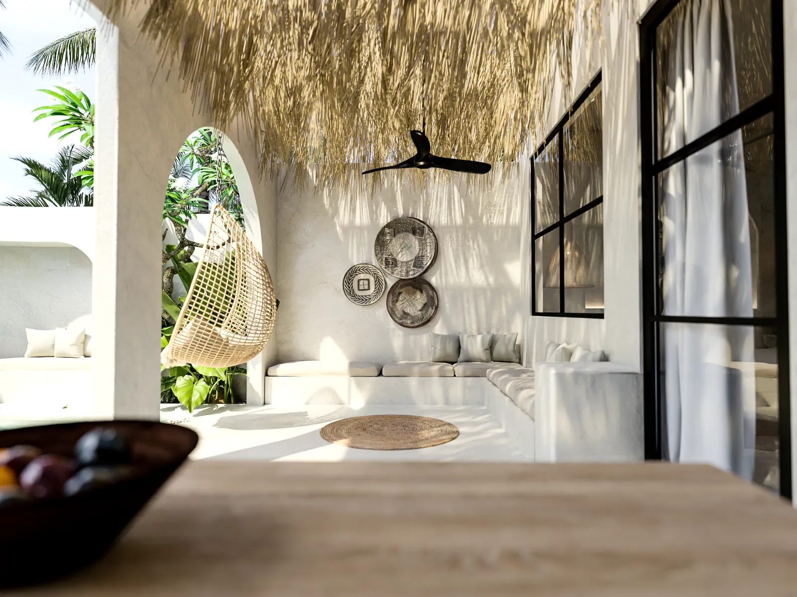 Casita Alas bedroom with arched window and natural finishes