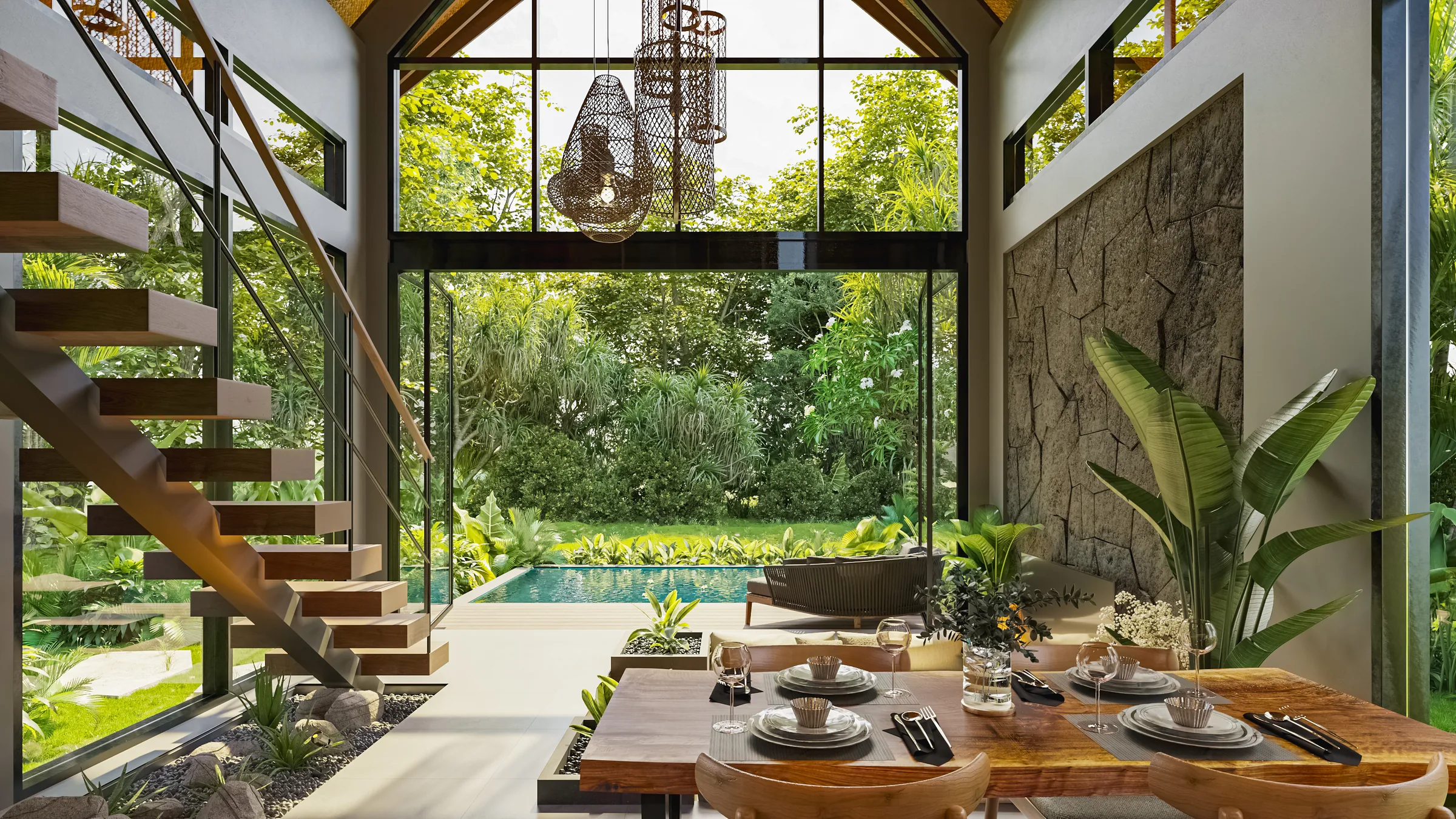 Double-height living room with an open timber staircase and a view to the garden, Tukad Huts one-bedroom